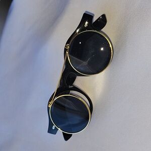 Glasses with raising shades